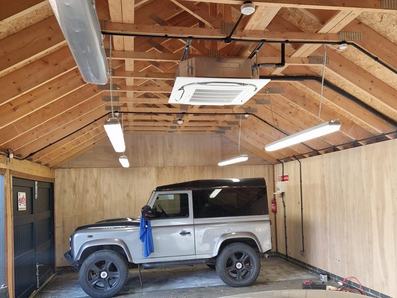 Air conditioning unit installed into garage