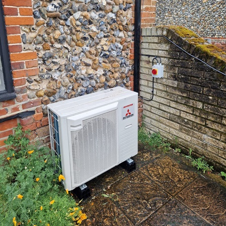 Air conditioning condensor in back garden