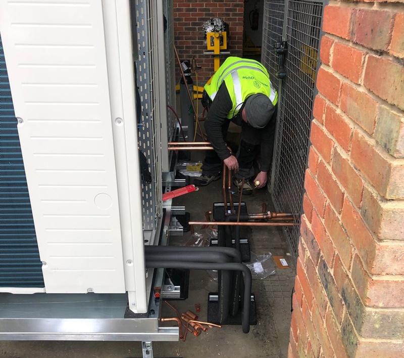 Air Conditioning unit being repaired